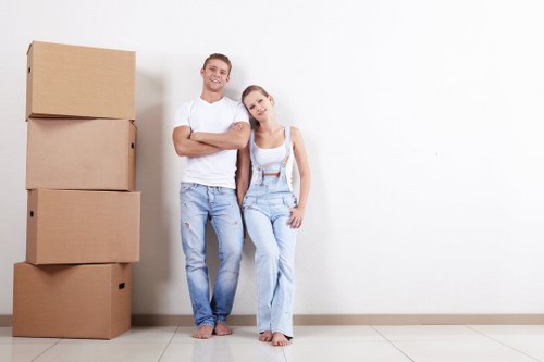Professional packing team organizing boxes in a Brompton home