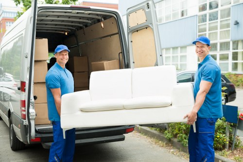 Professional house removalists in Brompton loading furniture into a moving truck