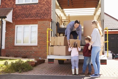 Professional man with van helping with boxes and furniture