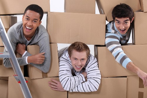 Packing boxes and preparing belongings for a Brompton flat move